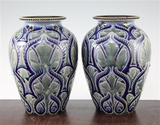 A pair of Doulton Lambeth stoneware ovoid vases, by Frank A. Butler, 1884, 22cm